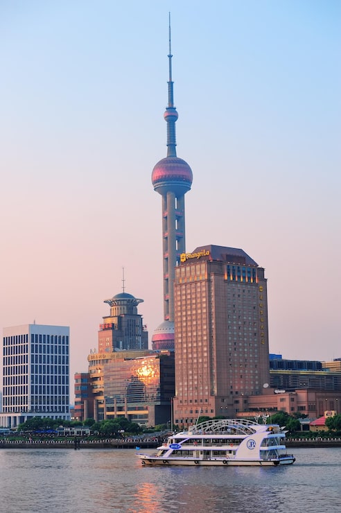 Photo Gratis arsitektur perkotaan dan kaki langit shanghai saat matahari terbenam