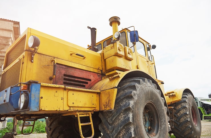 Photo Gratis buldozer pemuat konstruksi berat di area konstruksi.