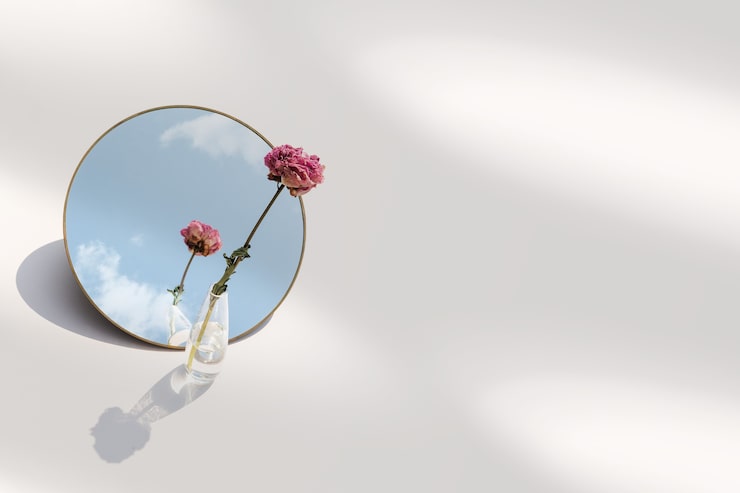 Foto gratuito fondo estético de una flor en un jarrón