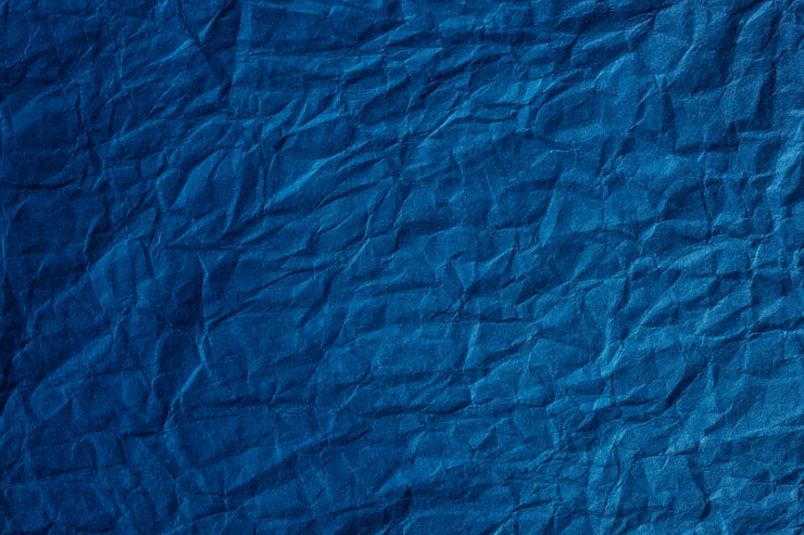 Foto gratuito fondo de textura de papel azul arrugado