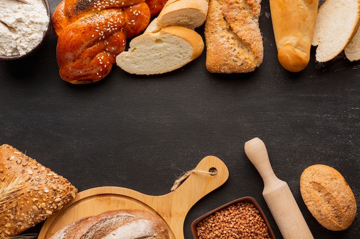Foto gratuito lay flat de surtido de pan con semillas