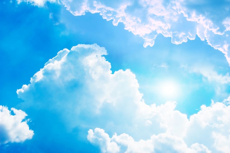 Foto gratuito sol entre las nubes