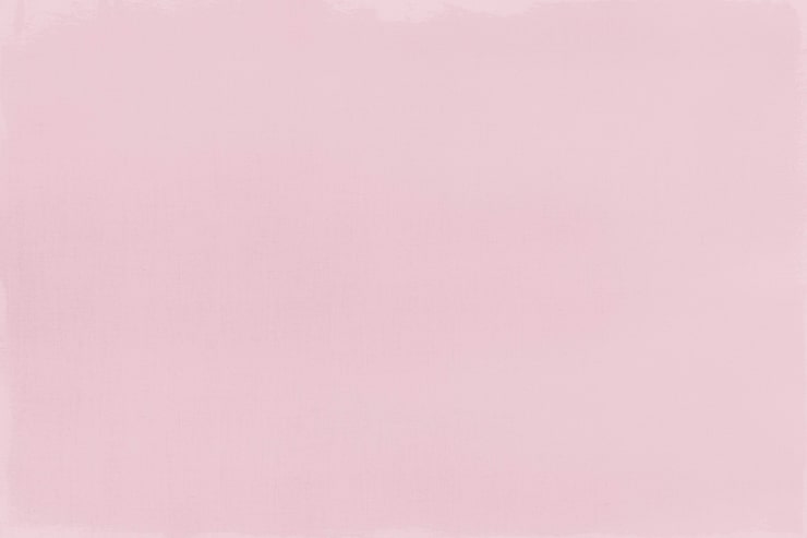 Foto gratuito textura de tela rosa