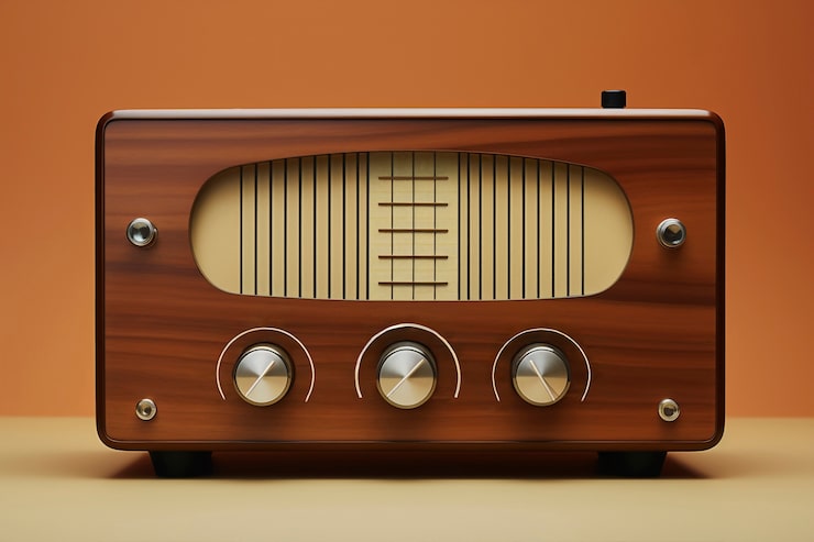 Foto gratuito vista de un dispositivo de radio antiguo en tonos de cáscara de nuez