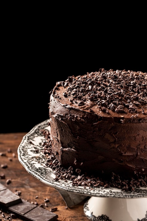 Foto gratuito deliziosa torta al cioccolato con spazio per le copie