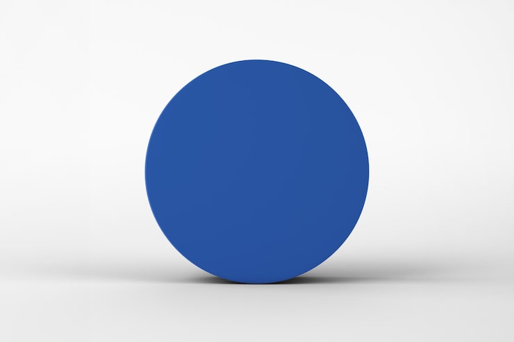 Foto gratuito un vivace cerchio blu su uno sfondo bianco una semplice forma geometrica