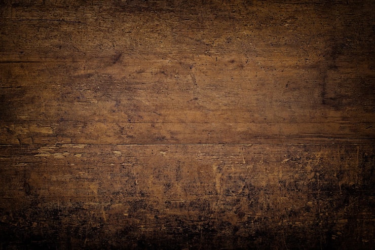 Foto tavolo scuro con consistenza di legno marrone sullo sfondo di vecchie tavole