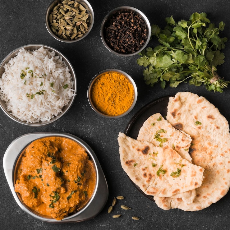 Foto grátis arranjo de comida indiana plana