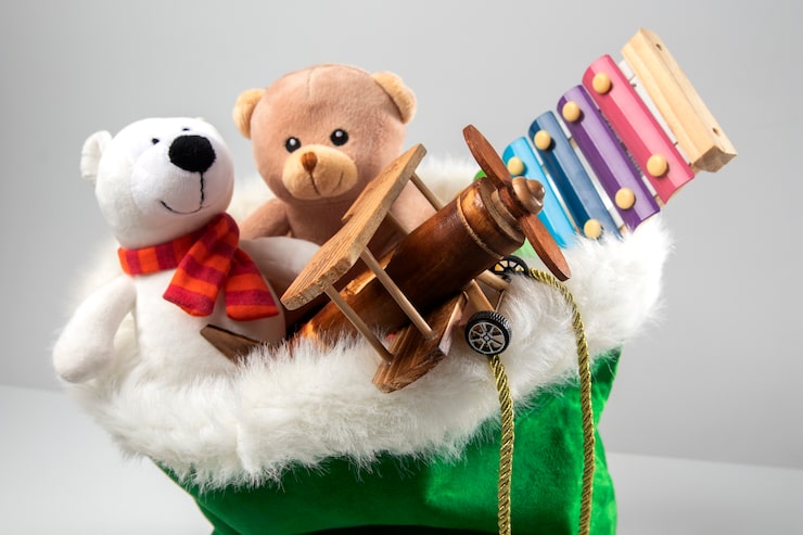 Foto grátis vista do saco de papai noel com presentes e brinquedos