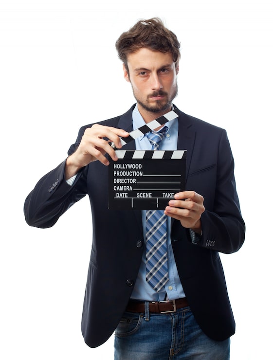Kostenlose Foto der mann mit anzug und eine filmschindel