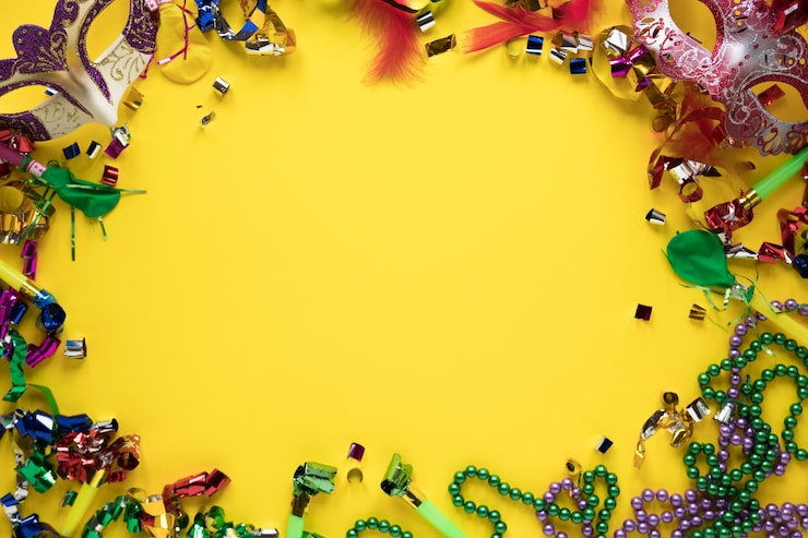 Kostenlose Foto rahmen aus karneval zeug auf gelb