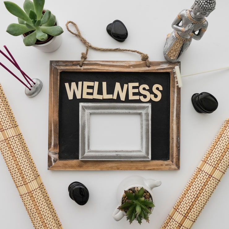 Kostenlose Foto wellness-komposition mit schriftzug und tafel