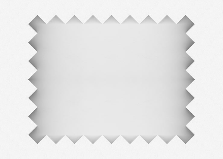 Foto marco blanco del cenmet del modelo de zigzag en fondo gris de la pared del espacio de la copia.
