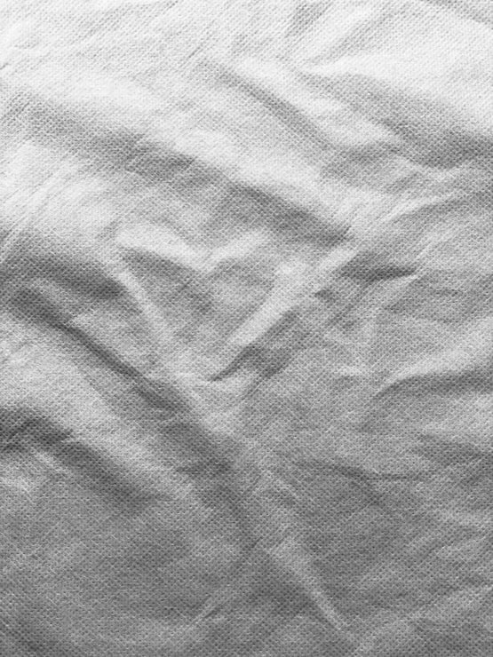 Foto patrón de textura de tela de papel desmenuzado blanco