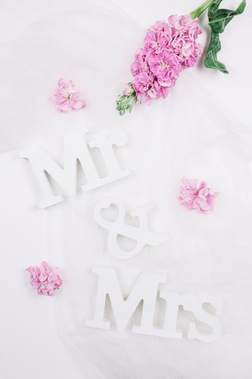 Gratis Foto mr og mrs med blomster