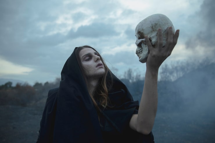 Gratis Foto shakespeares idé om en mann som holder et hodeskalle