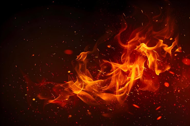 Gratis Bild eldflamma med gnista i svart bakgrund