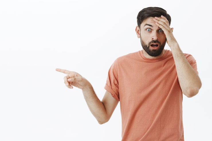 Gratis Bild expressiv skäggig man i orange t-shirt