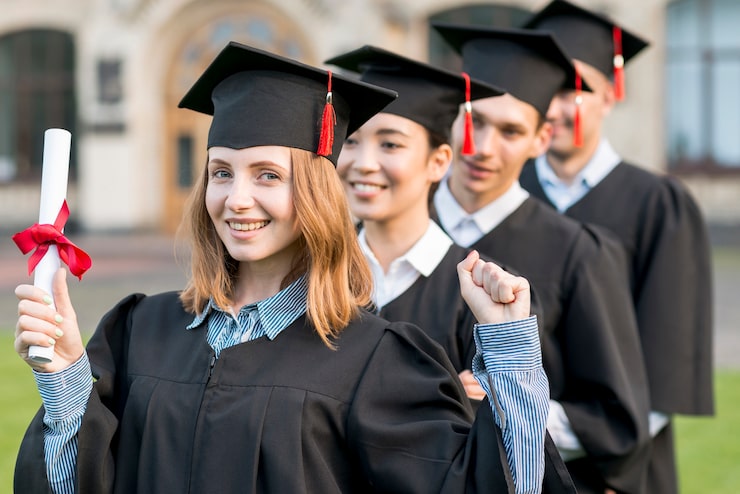Gratis Bild porträtt av grupp studenter som firar sin examen