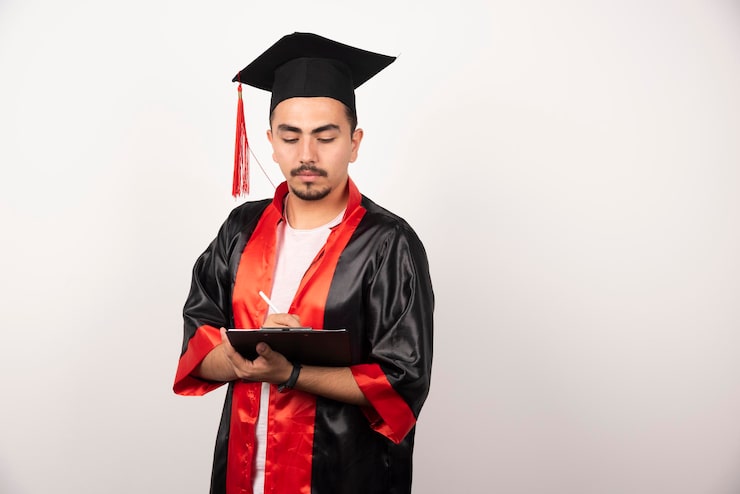 Gratis Bild ung utexaminerad student som skriver på vitt.