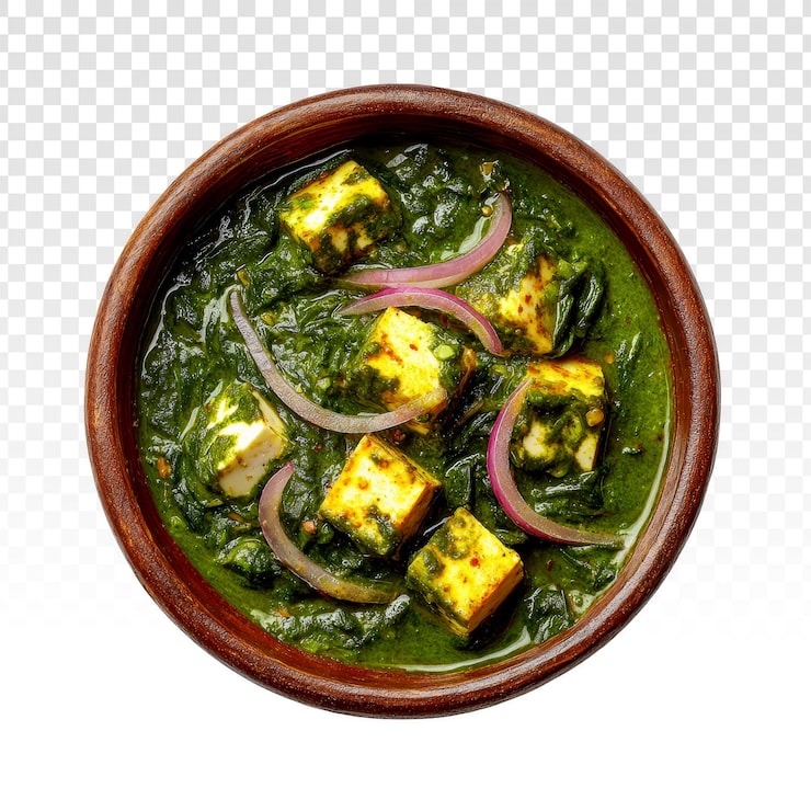 Gratis PSD läcker palak paneer med garnering av rödlök i en träskål