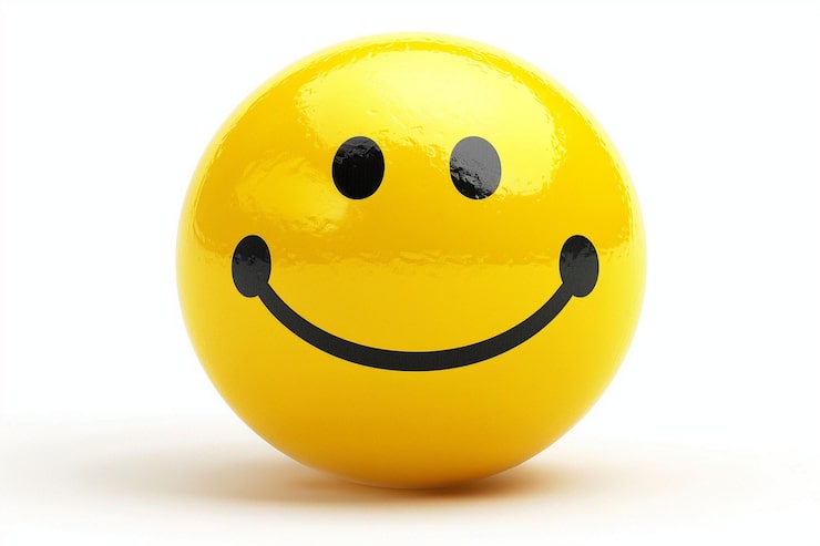Photo une balle jaune avec un smiley dessus