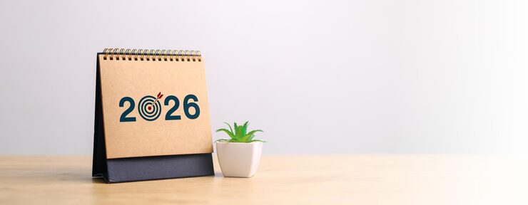 Photo fixation d'objectifs en 2026 entrepreneur touchant la barre de progrès de 2025 à 2026 création de nouvelles entreprises