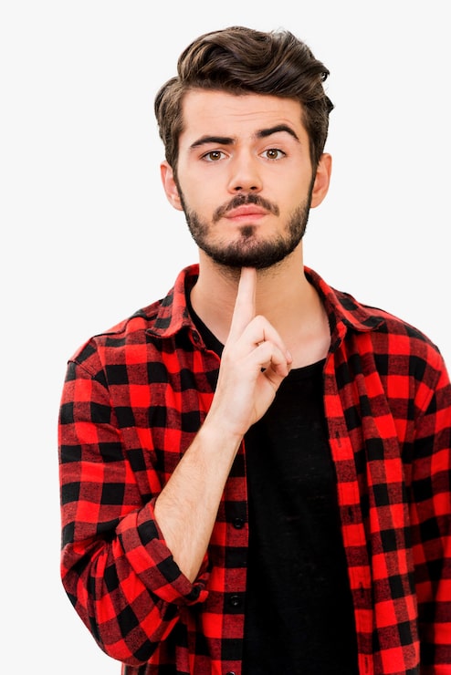 Foto jeg er lei av det. kjekk ung mann ser på kameraet og gestikulerer med en pistol mens han står mot en hvit bakgrunn
