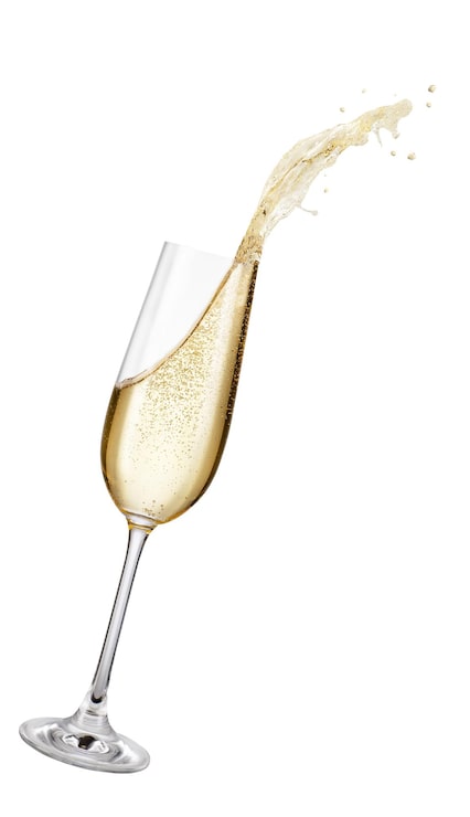 Bild glas champagne med stänk