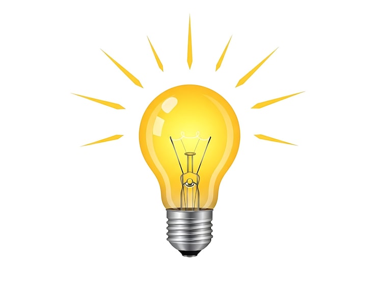 Bild ljusgul glödlampa med utstrålande ljusstrålar idé innovation kreativitet energi kunskap inspiration