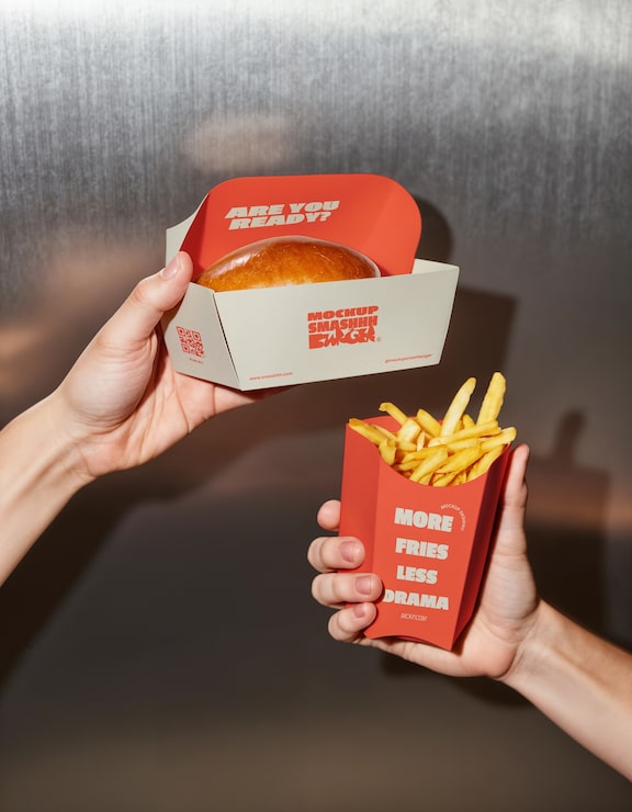 Burger and fries in a takeout box