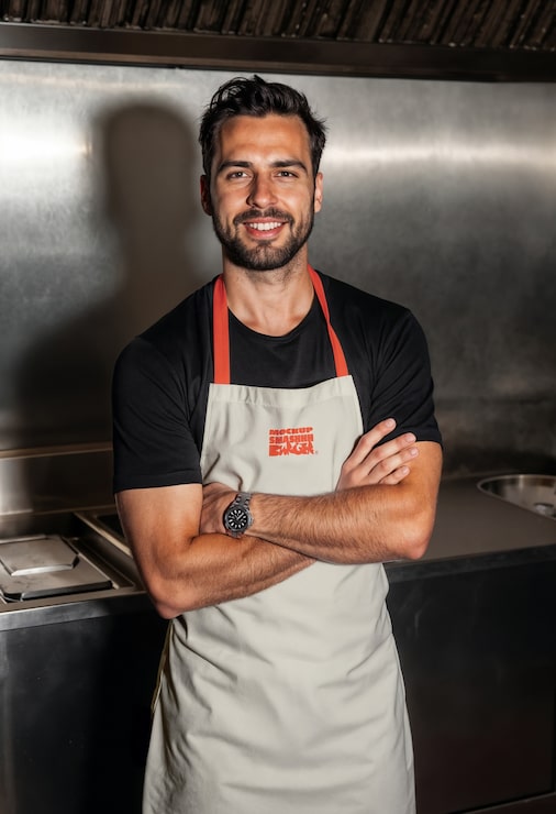 Chef with apron mockup in kitchen