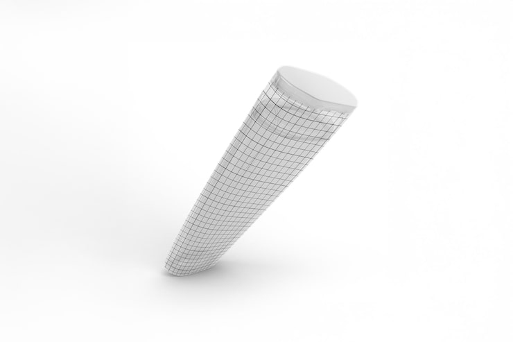 PSD Gratis objek silinder 3d abstrak dengan tekstur kisi