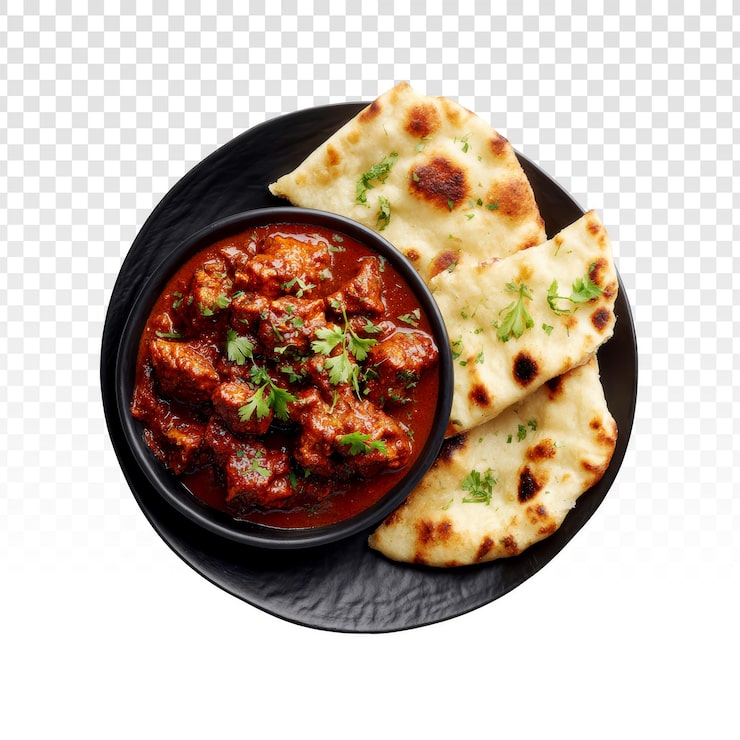 PSD grátis curry de frango indiano autêntico com pão naan em um prato preto.
