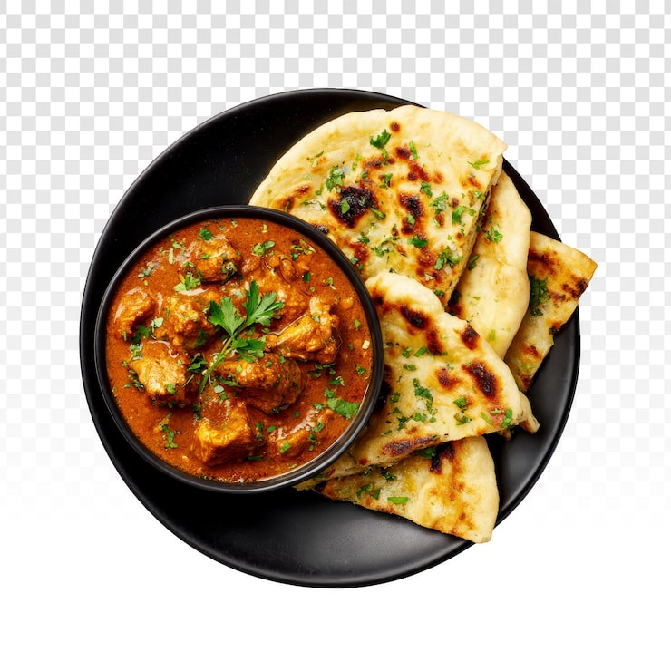 PSD grátis delicioso curry de frango com pão naan em um prato preto