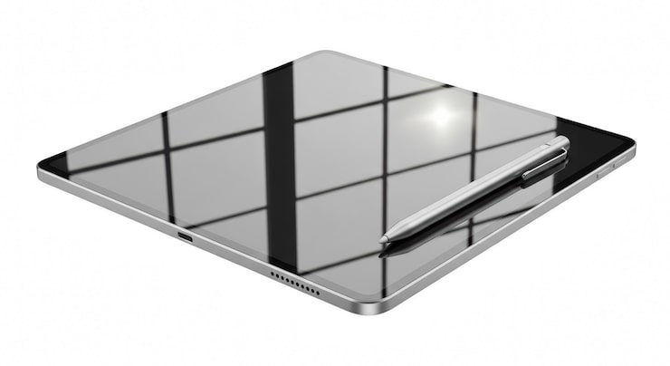 PSD tablet plateada con lápiz óptico sobre fondo blanco