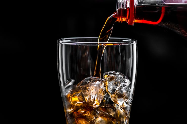 Ücretsiz Fotoğraf gazlı kola içeceği makro çekimi