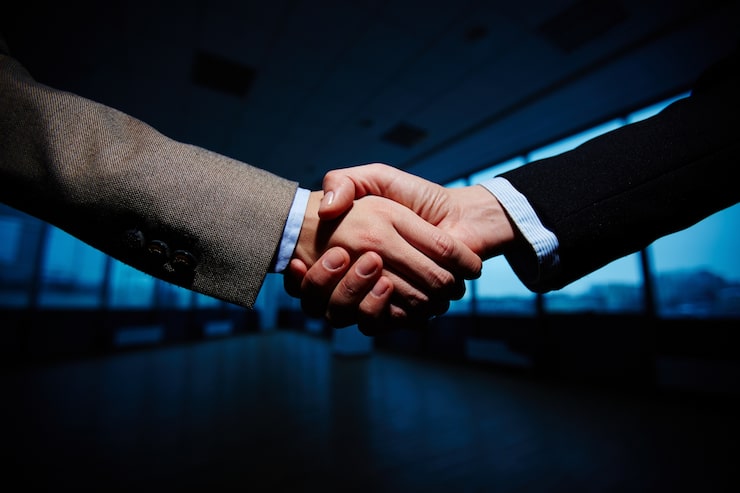 Gratis Foto handdruk van zakenlieden